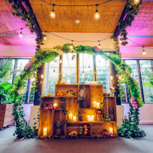 tropical zoo greenery white wire arch