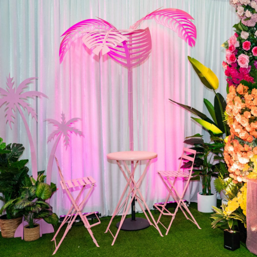 white velvet drape and white padded chairs