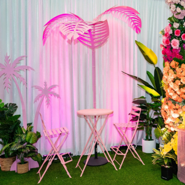 white velvet drape and white padded chairs