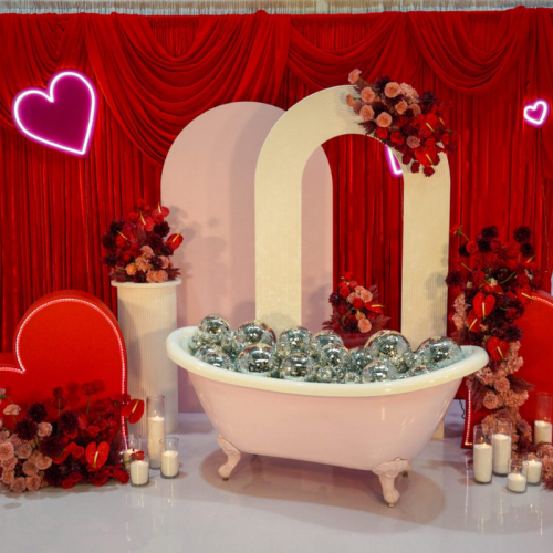 red burlesque mannequin red draped dining room