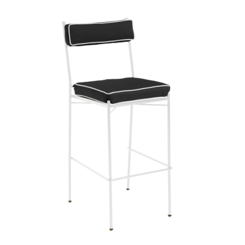 white metal chair with black and white pillows