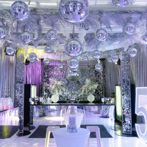 silver mirror balls and white draped roof