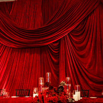 scalloped deep red velvet drape 