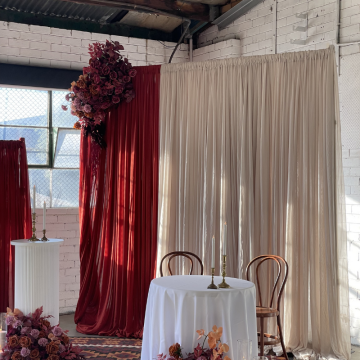 wedding ceremony terracotta and beige draping