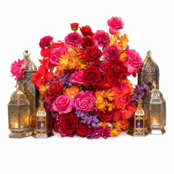 Moroccan Sunset Floral Feature with vibrant artificial florals, roses, orchids and decorative lanterns for Arabian Night wedding and event styling.
