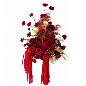 Ruby Royale Floral Feature with deep red artificial roses, gold foliage and cascading faux florals, perfect for luxury wedding and event styling.
