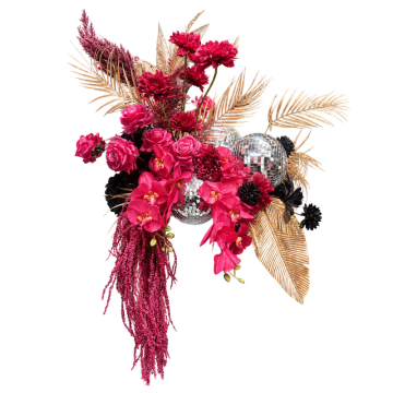 Disco Fever Floral Feature with pink and black artificial florals, mirror balls, gold foliage and faux flowers for wedding and event bar styling.