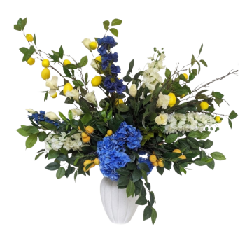 Capri Garden Floral Feature with blue hydrangeas, lemon branches, white artificial flowers and lush greenery for Amalfi-inspired event styling.
