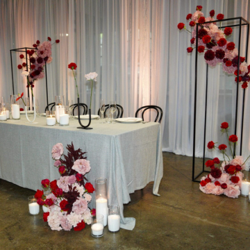 wedding reception head table white chiffon backdrop